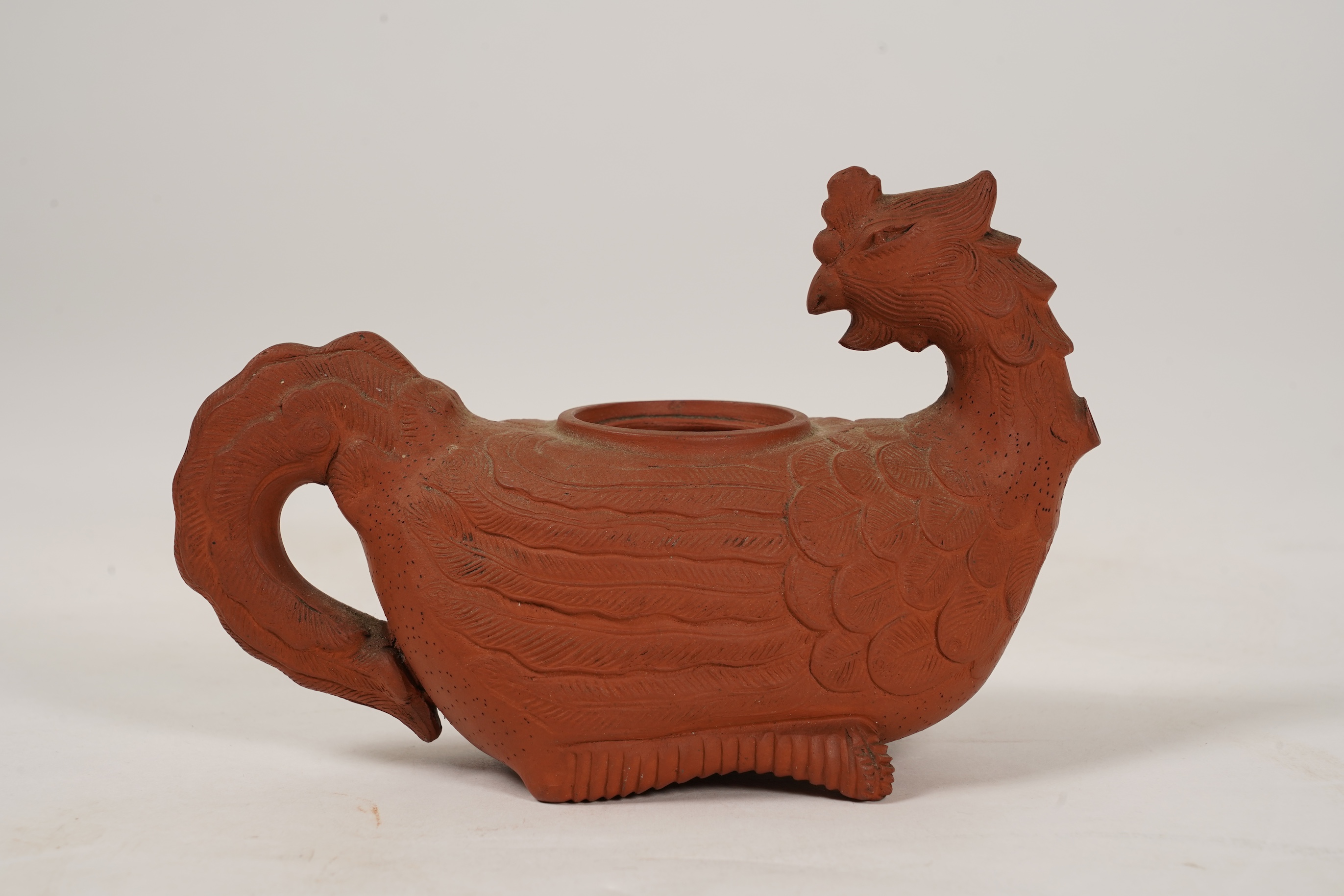 A Chinese Yixing 'Phoenix' teapot, late Qing dynasty